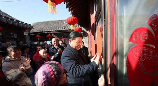 習近平春節前夕在北京看望慰問基層幹部群眾
