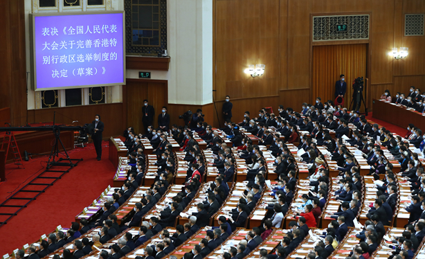 全國人大高票通過關於完善香港特別行政區選舉制度的決定